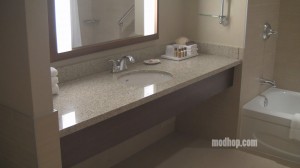 a bathroom sink with a mirror