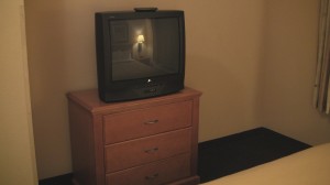 Small TV and dresser.